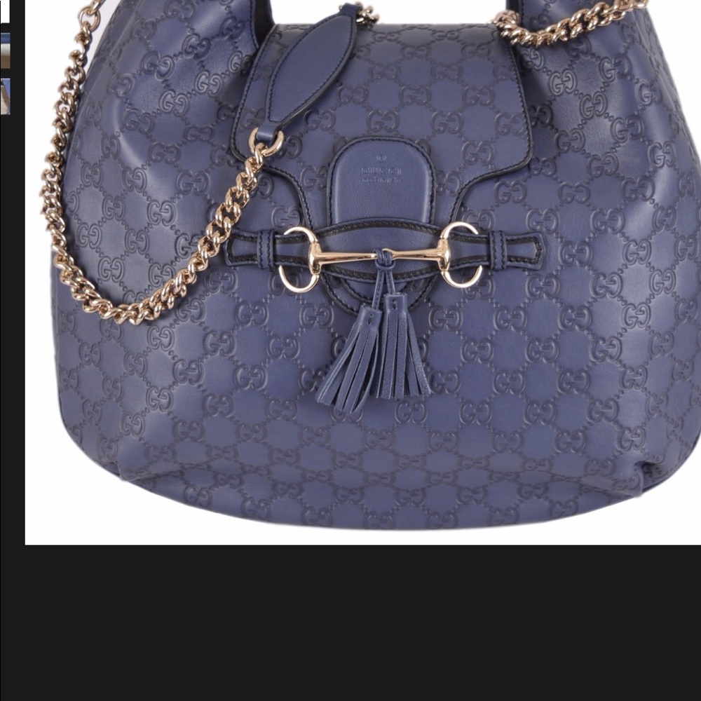 Blue guccissima leather with blue leather trim .